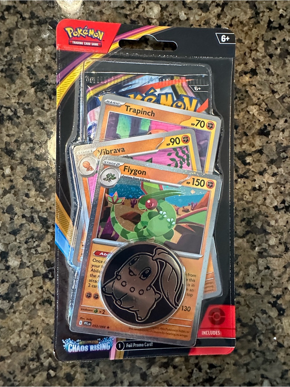 Chaos Rising mega evolution pokemon blister pack with foil promo card and coin